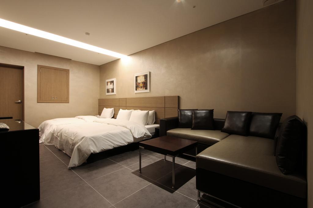 Antives Hotel Kojang Szoba fotó